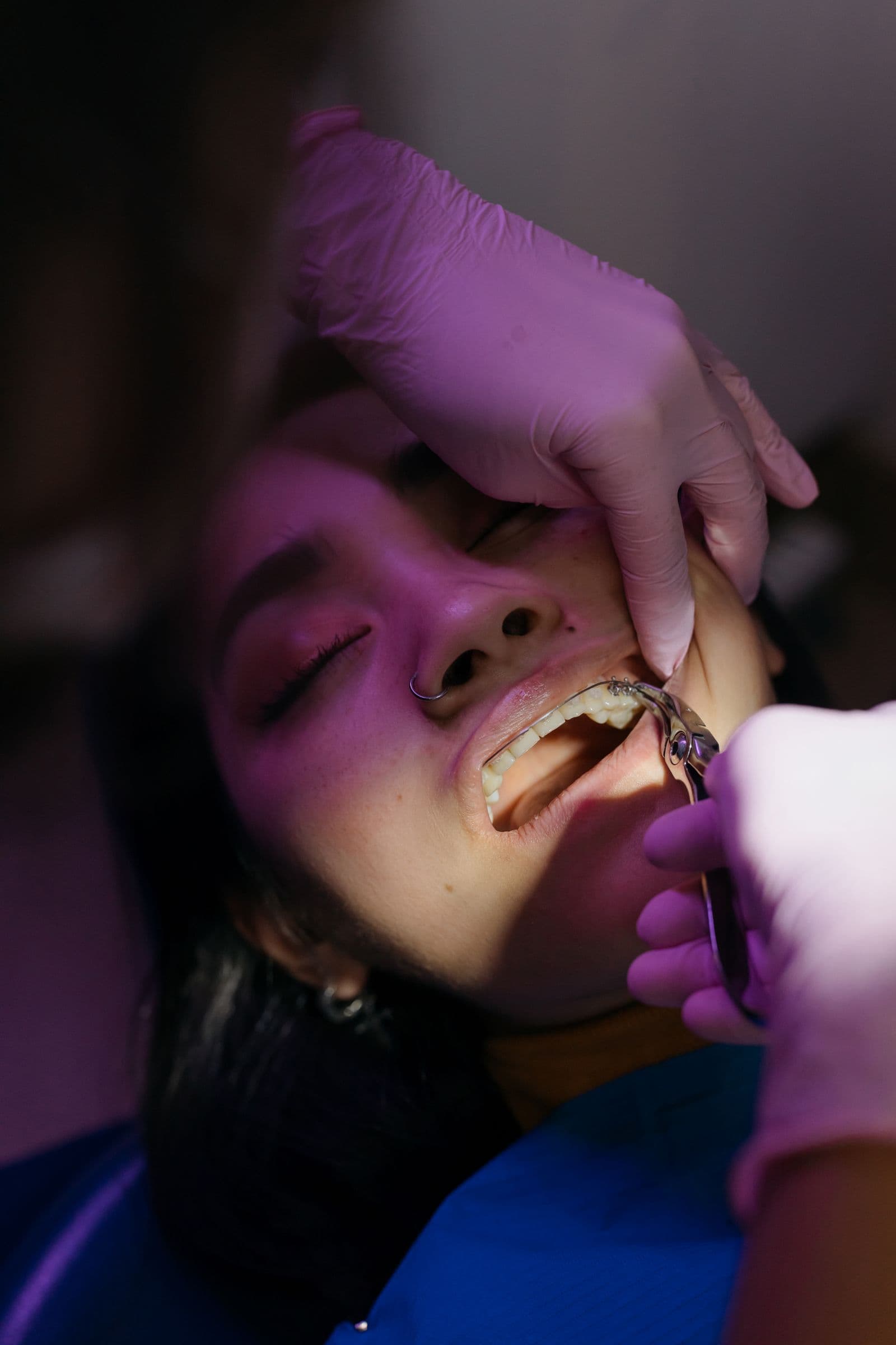 Dentist providing gentle, attentive care during treatment